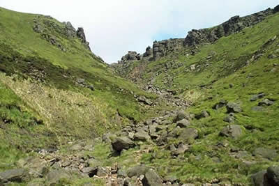 In its upper reaches, Grindsbrook Clough is much rockier