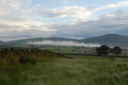Carrock Fell rises above the early morning mists