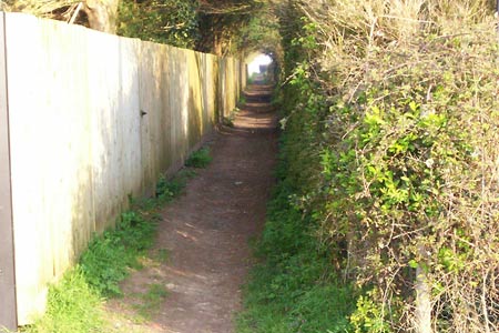 The narrow path from Mill Hill towards open downs