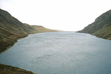 Looking east down Llyn Cowlyd Reservoir towards the dam