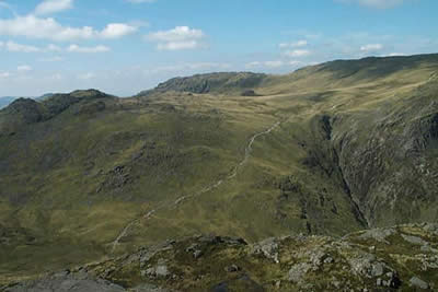 The path from Red Tarn climbs steadily across the fellside