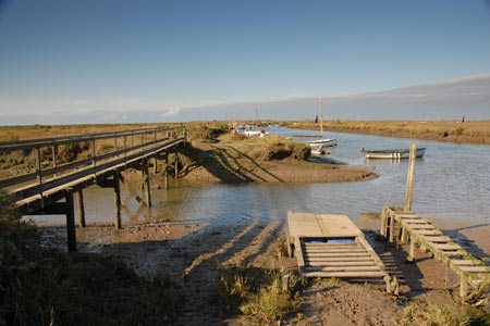 The footbridge leading onto Morston Salt Marshes
