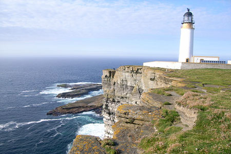 Cliffs and lighthouse at Noup Head, Westray, Orkney Islands